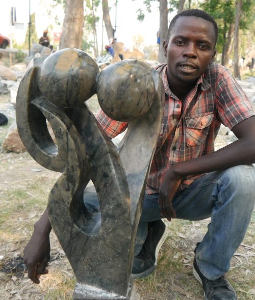 Lovers, gemaakt van heel hard, prachtig gekleurde fruitsteen door Cliff Makore uit Chitaunike Village in Zimbabwe.